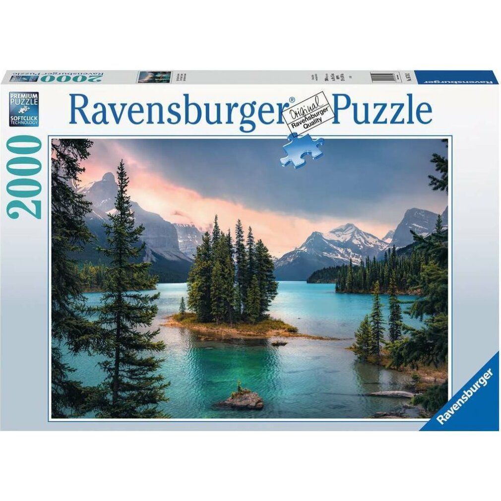 Scatola puzzle Ravensburger, 2000 pezzi. Immagine di un'isola boscosa in un lago turchese, montagne sullo sfondo. Marchio e numero di pezzi visibili.