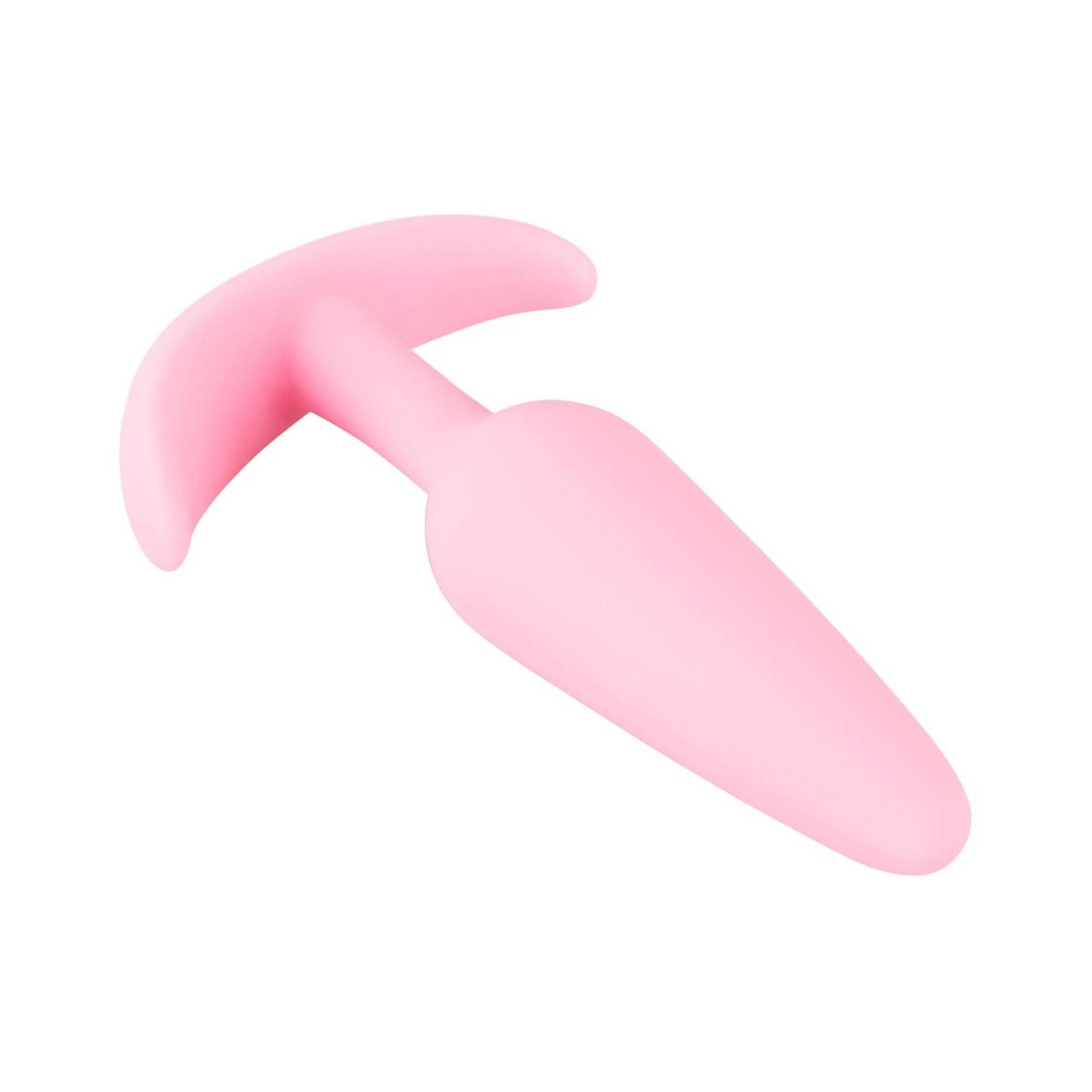 Plug rosa, punta conica, base curva. Realizzato in materiale morbido.