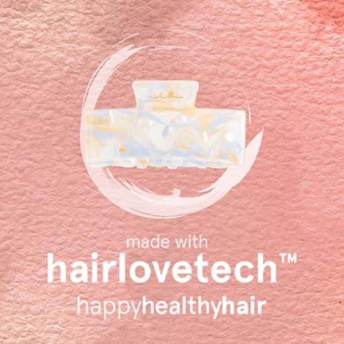 Fermaglio per capelli marmorizzato. Testo: made with hairlovetech, happy healthy hair.