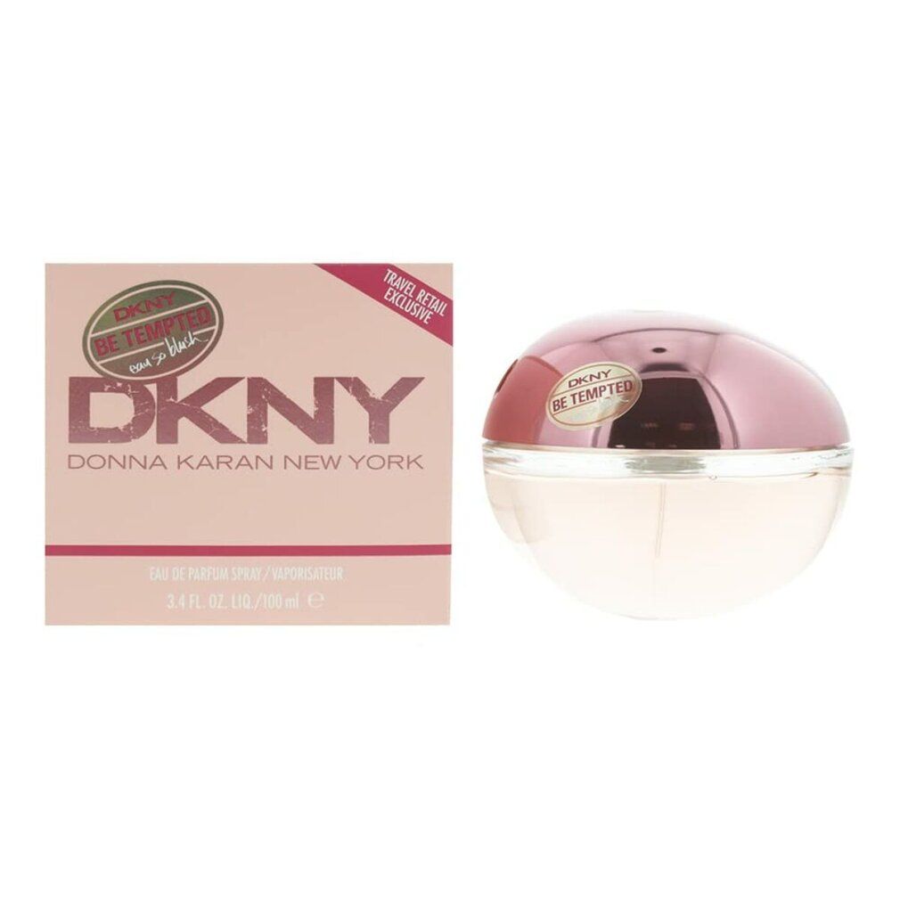 Confezione rosa e flacone. Flacone con tappo rosa e logo DKNY.