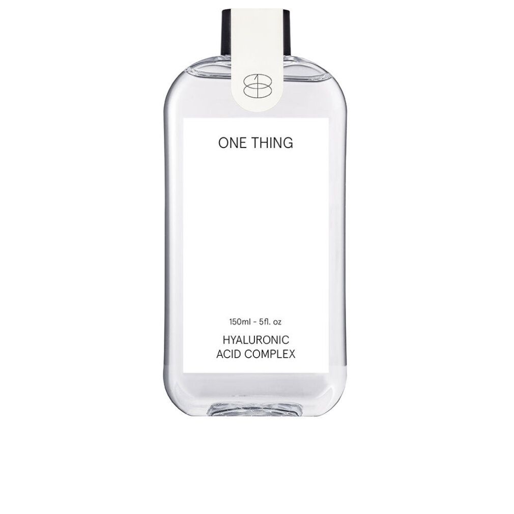 Flacone trasparente con etichetta bianca. Scritta: ONE THING, Hyaluronic Acid Complex. Tappo nero.
