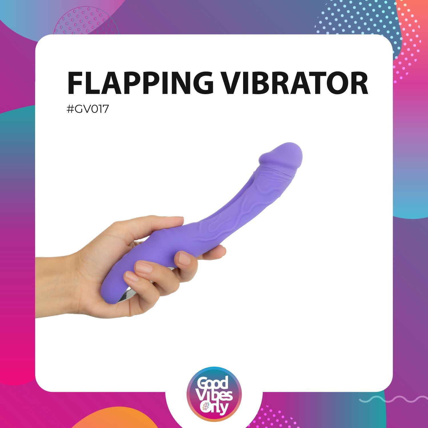 Vibratore viola in una mano. Il vibratore è leggermente curvo e di forma allungata.