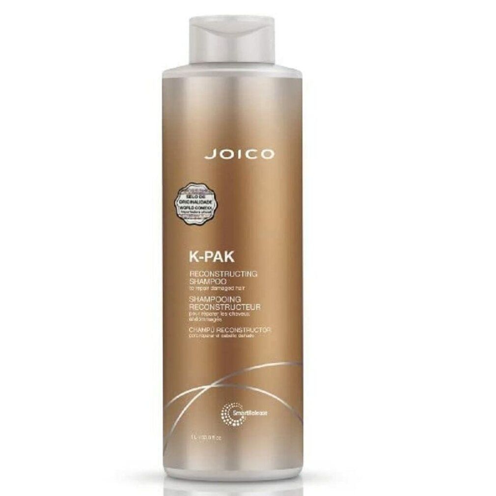 Flacone di shampoo dorato con tappo bianco. Scritta: JOICO, K-PAK RECONSTRUCTING SHAMPOO. Con logo di certificazione.