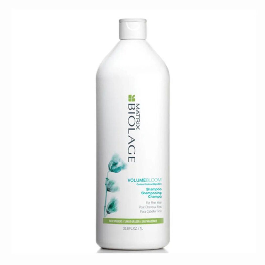 Flacone di shampoo bianco con etichetta verde. Scritta: Matrix Biolage VolumeBloom Shampoo. Per capelli fini. 1L.