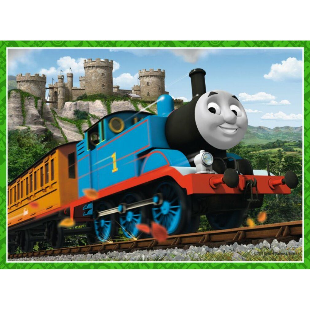 Puzzle con Thomas il treno davanti a un castello. Foglie gialle e rosse.