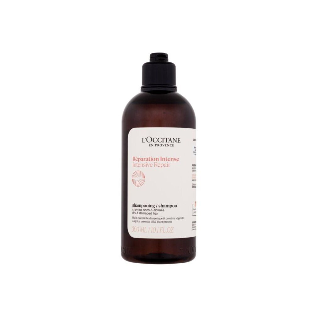 Flacone di shampoo marrone con tappo nero. Etichetta con nome e testo del prodotto. L'OCCITANE Shampoo Riparatore Intensivo 300 ml.