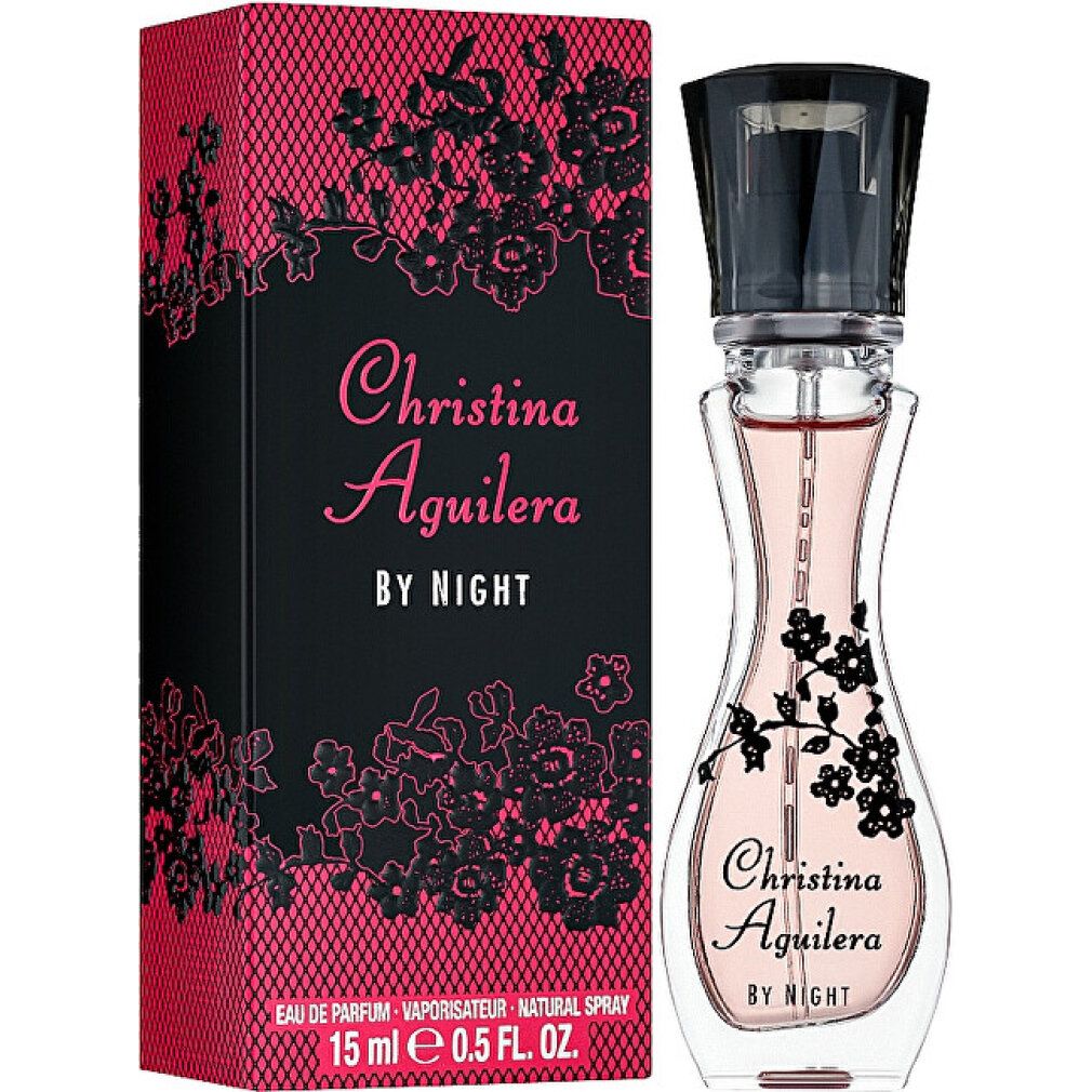 Flacone di profumo e confezione. Flacone con tappo nero e decoro floreale. Confezione con motivo floreale e scritta.