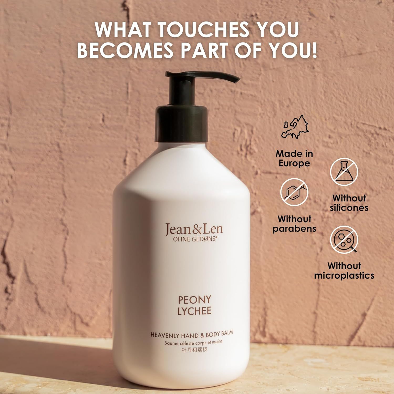 Flacone bianco con erogatore nero. Testo: WHAT TOUCHES YOU BECOMES PART OF YOU! Senza...