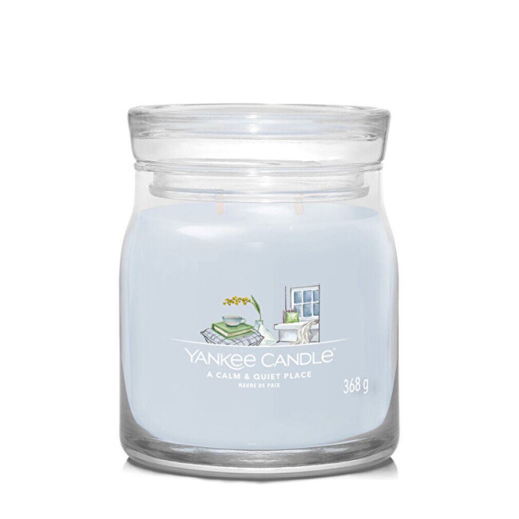 Vasetto di vetro con coperchio, candela. Etichetta con logo e testo. 368g.