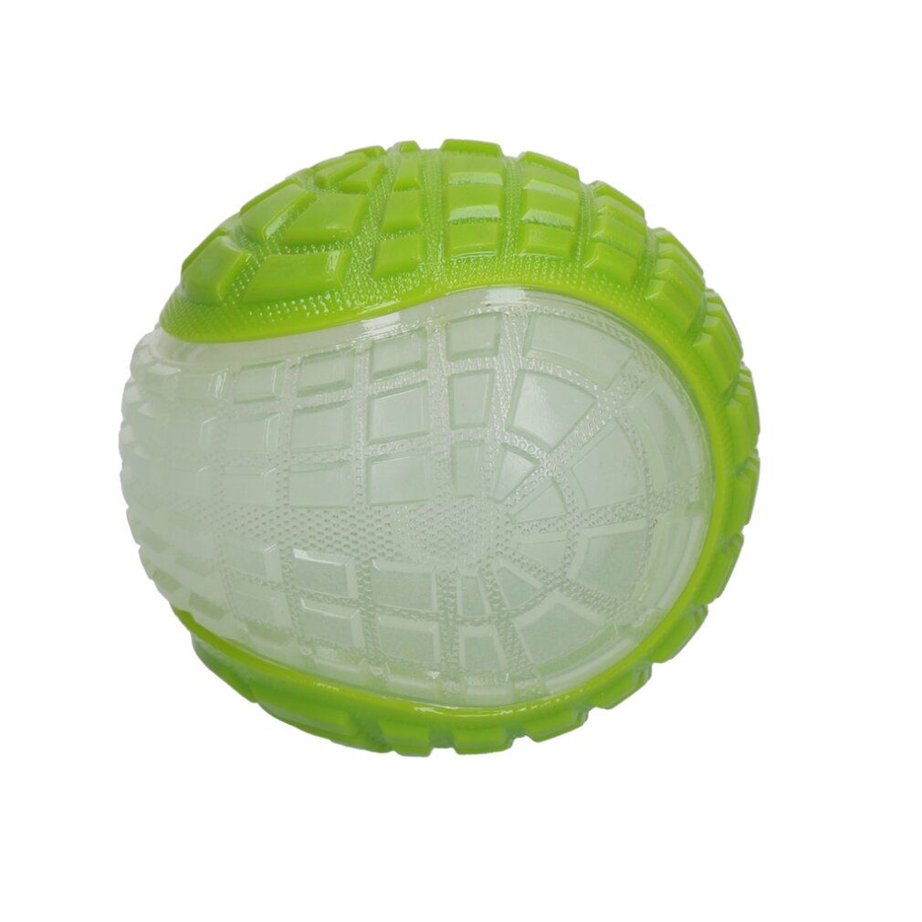 Palla verde luminosa con nucleo trasparente. Superficie con motivi quadrati e bordi in rilievo. Per cani.