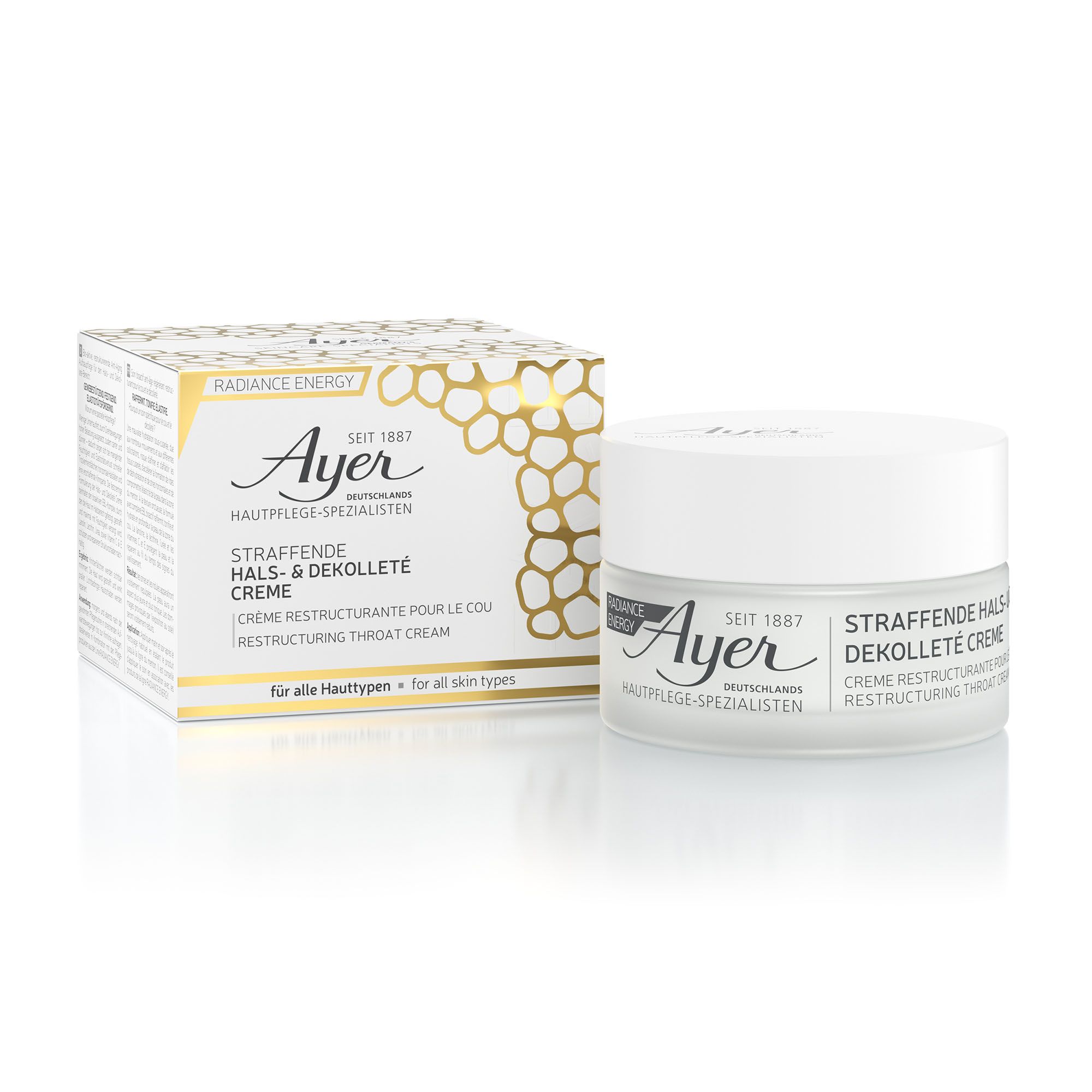 Vasetto di crema e confezione. Scritta: Ayer, Crema Ristrutturante per collo e décolleté. Confezione dorata con informazioni.