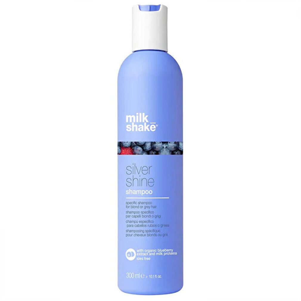 Flacone di shampoo blu. Scritta: milk shake, Silver Shine Shampoo. Con estratto di mirtillo bio. 300ml.