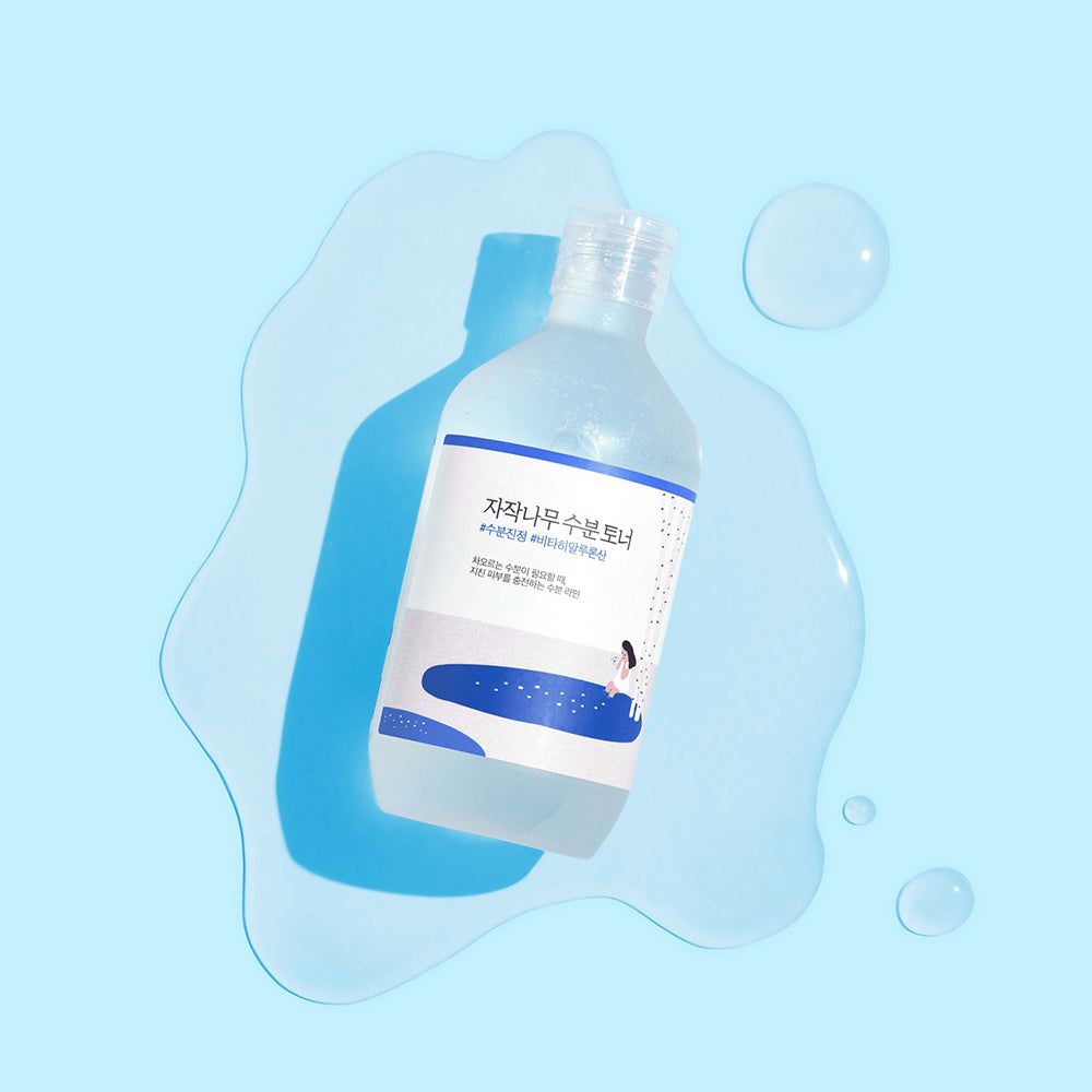 Flacone del prodotto con testo. Il prodotto è in acqua. Testo in coreano.