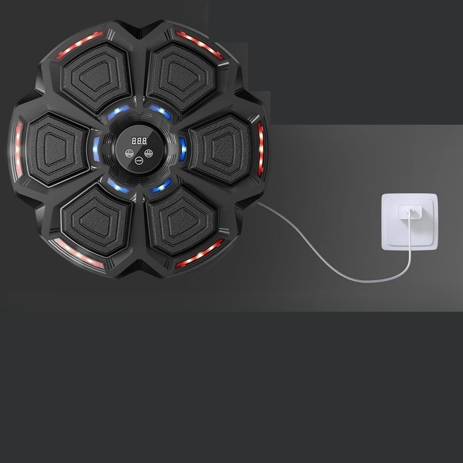 Dispositivo fitness rotondo nero con luci LED. Il dispositivo è collegato a una presa elettrica.