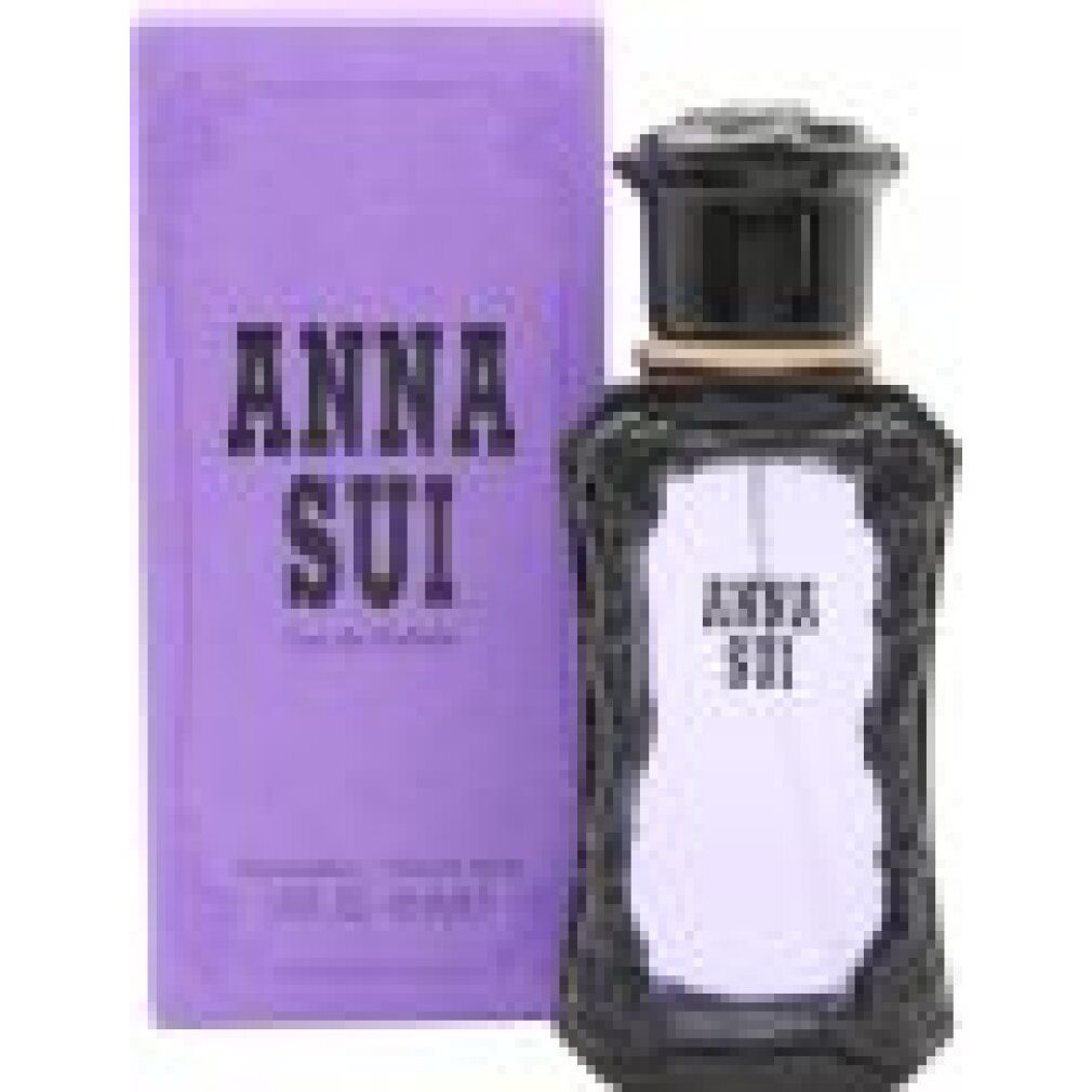Anna Sui Eau de Toilette Spray. Flacone con tappo nero e confezione viola. Scritta: ANNA SUI.