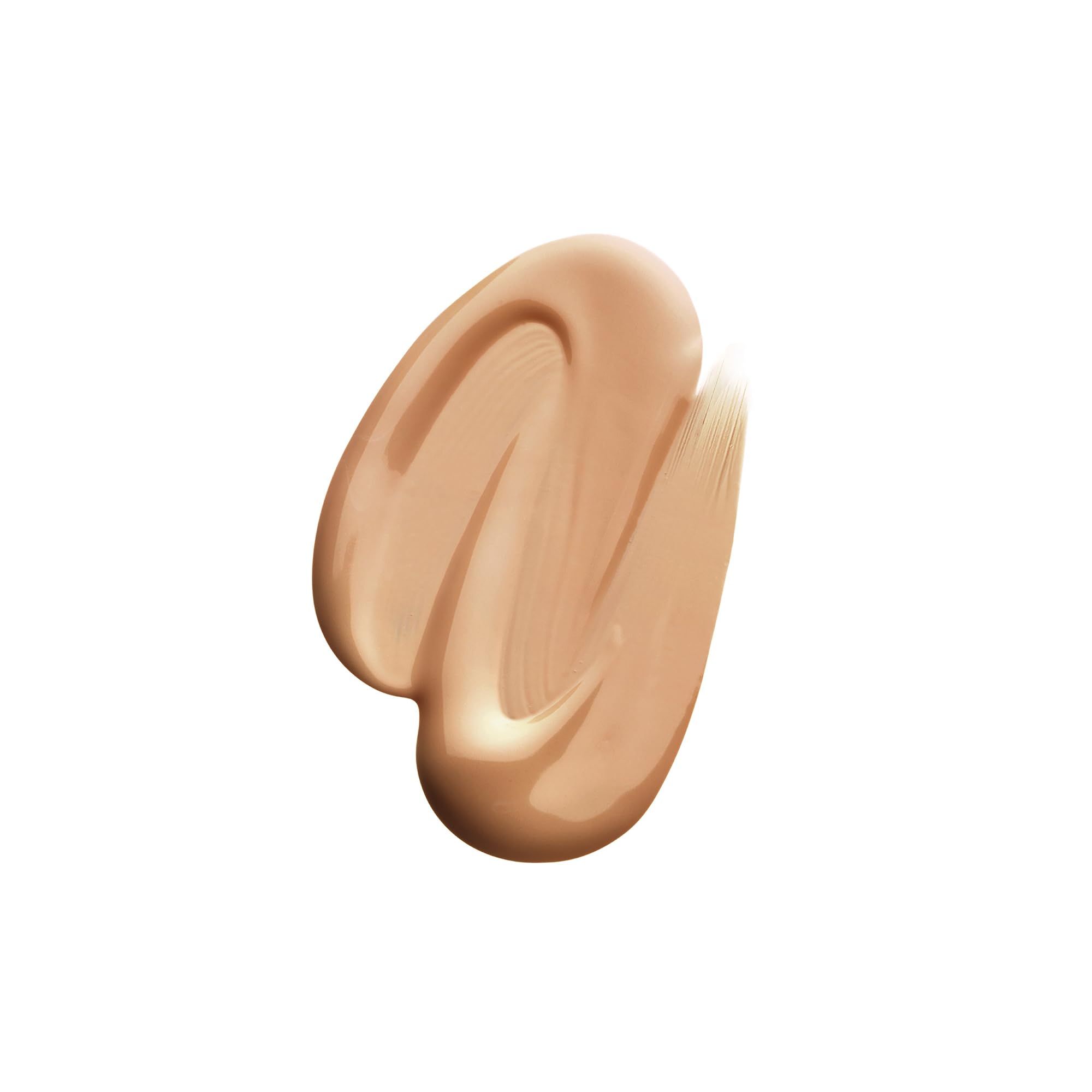 Campione di fondotinta liquido beige chiaro su sfondo bianco.