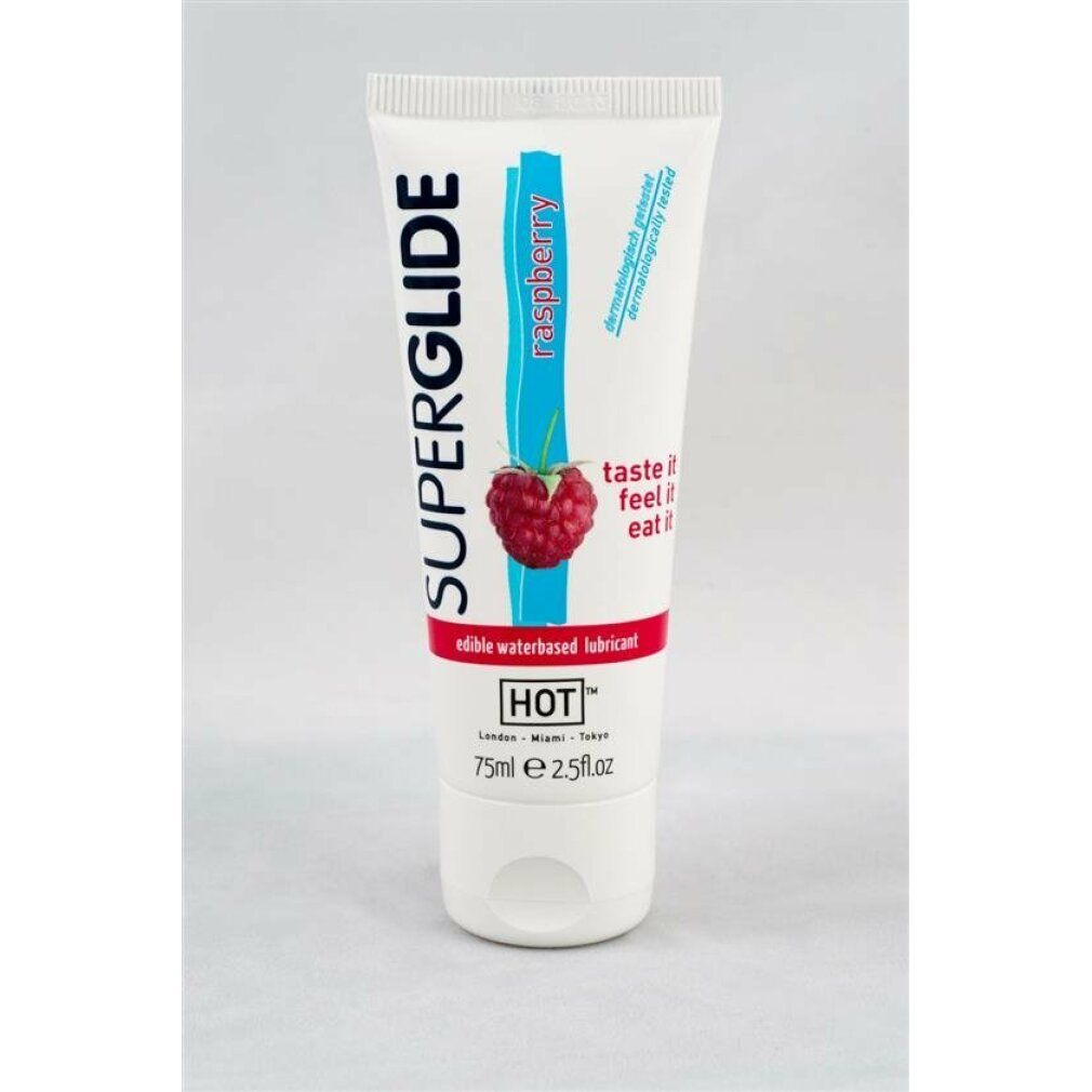 Tubo bianco con testo rosso. Nome prodotto: SUPERGLIDE. Gusto: lampone. Testo: "taste it, feel it, eat it". Marchio: HOT. Contenuto: 75ml.