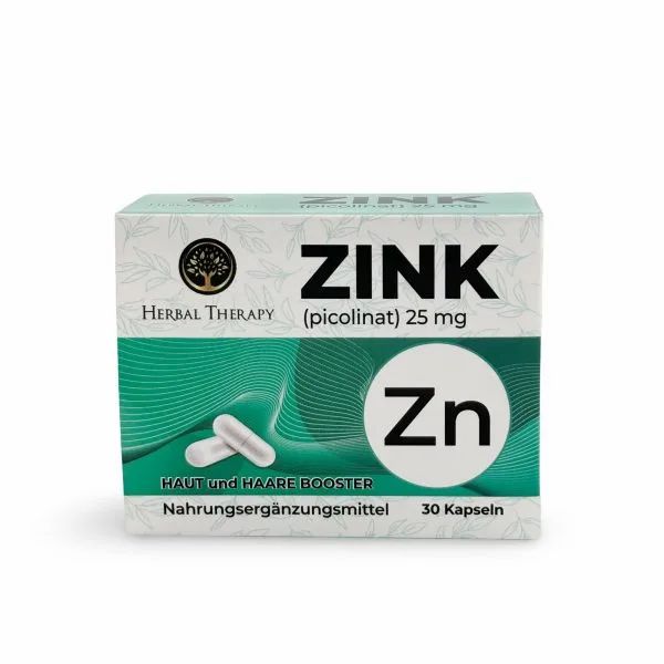 Scatola di Zink (picolinato) 25 mg. Scritta: Herbal Therapy, Zink, 30 capsule. Due capsule raffigurate. Motivi a onde verdi e bianche.