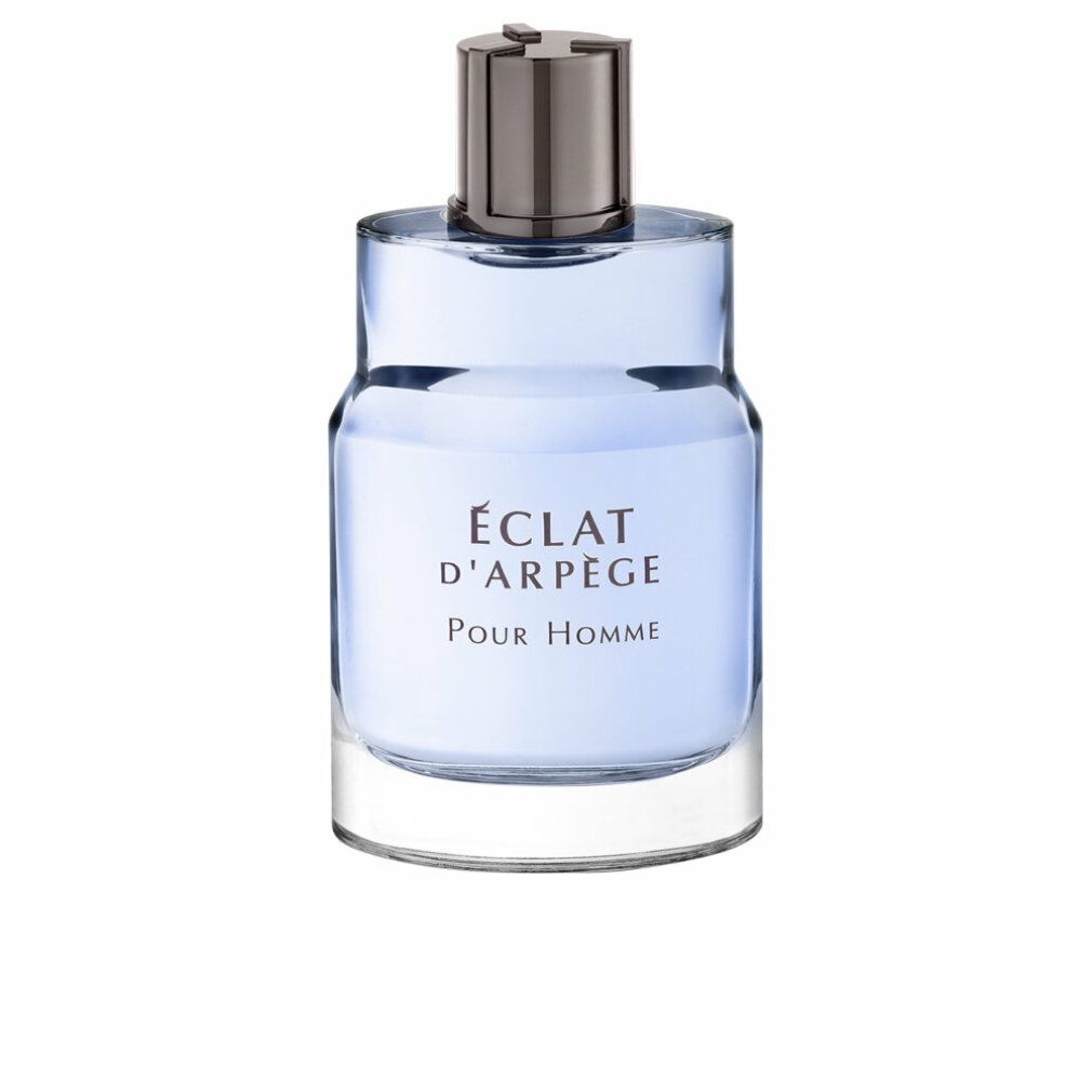 Flacone di profumo azzurro chiaro con tappo argentato. Scritta: Éclat d'Arpège Pour Homme. Flacone in vetro trasparente.