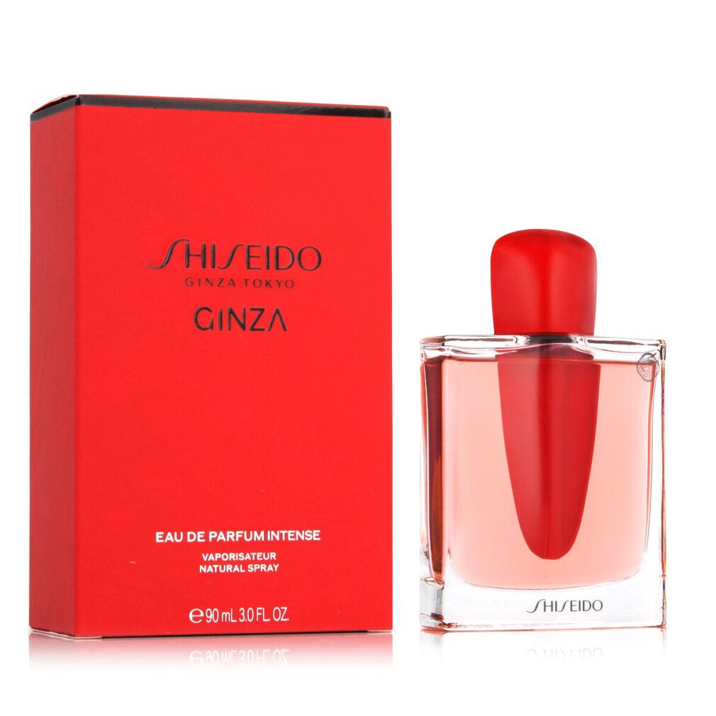 Scatola e flacone rossi. Flacone con tappo rosso, vetro trasparente e liquido rosso. Scritto: Shiseido Ginza.