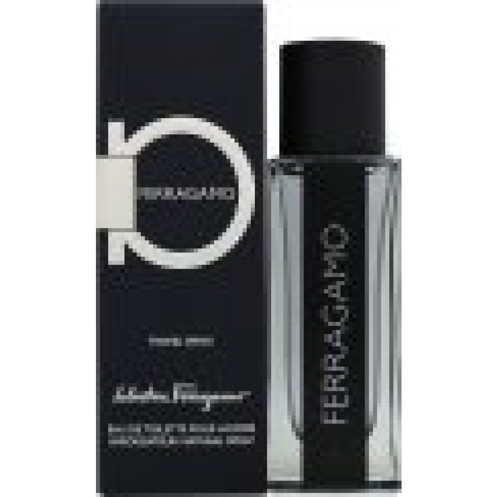 Eau de toilette con confezione. Flacone trasparente con tappo nero. Scritta: FERRAGAMO. Confezione nera con logo e scritta.