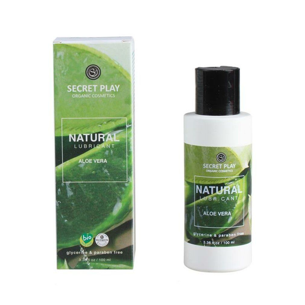 Flacone e confezione. Scritta: "Natural Lube Aloe Vera". Sigillo bio. Marchio: Secret Play. Flacone bianco, tappo nero.