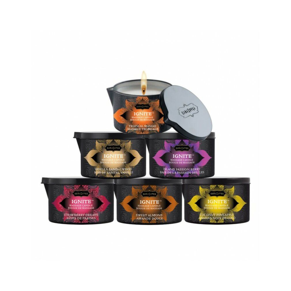 Sei candele da massaggio con coperchi. Diverse fragranze. Contenitori neri con etichette colorate. Scritta: Ignite.