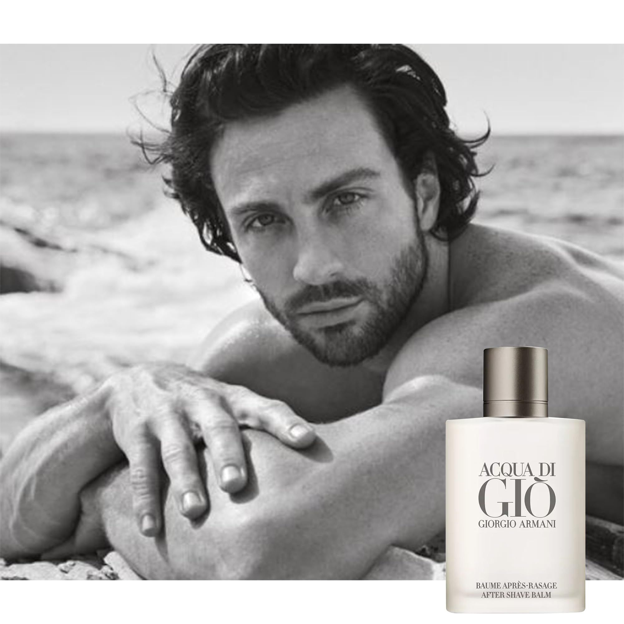 Flacone in vetro con tappo argentato. Scritta "ACQUA DI GIÒ". Sfondo: uomo sulla spiaggia.