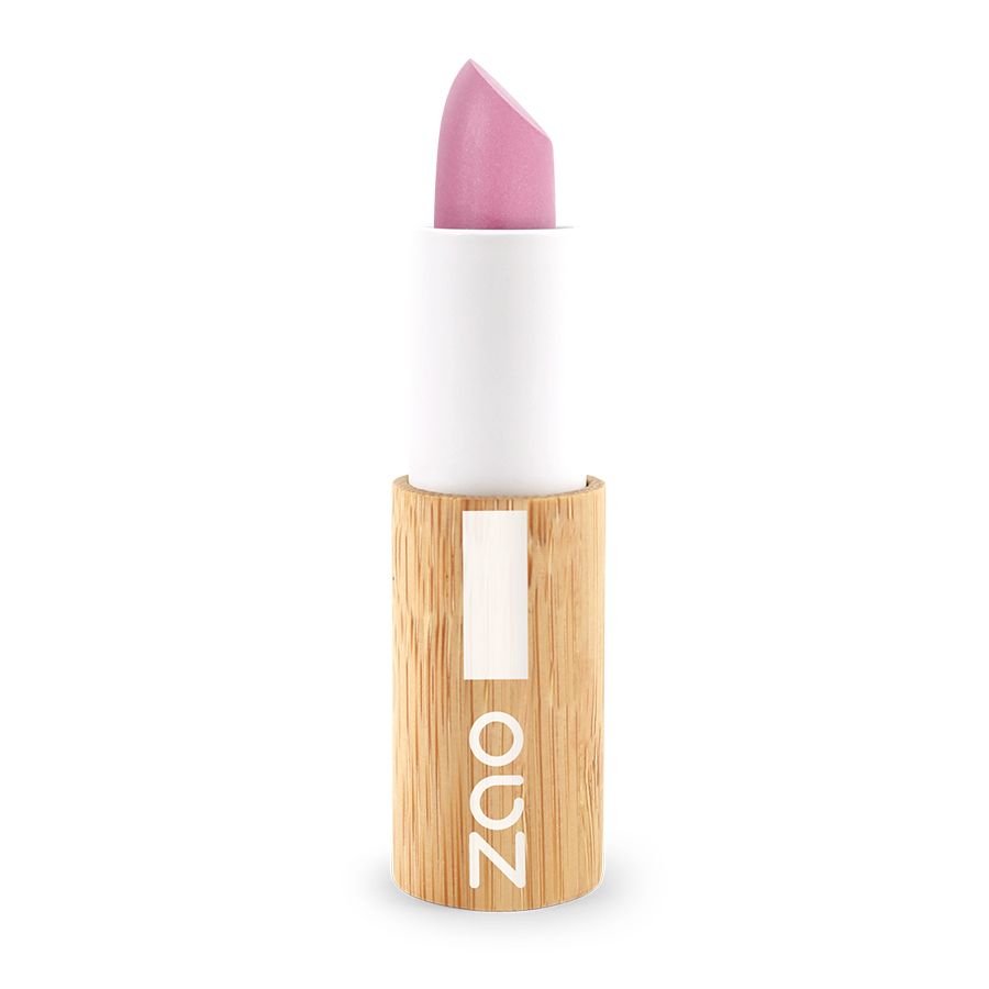 Rossetto rosa chiaro. Stelo bianco, custodia in legno con logo "ZAO". Texture naturale.