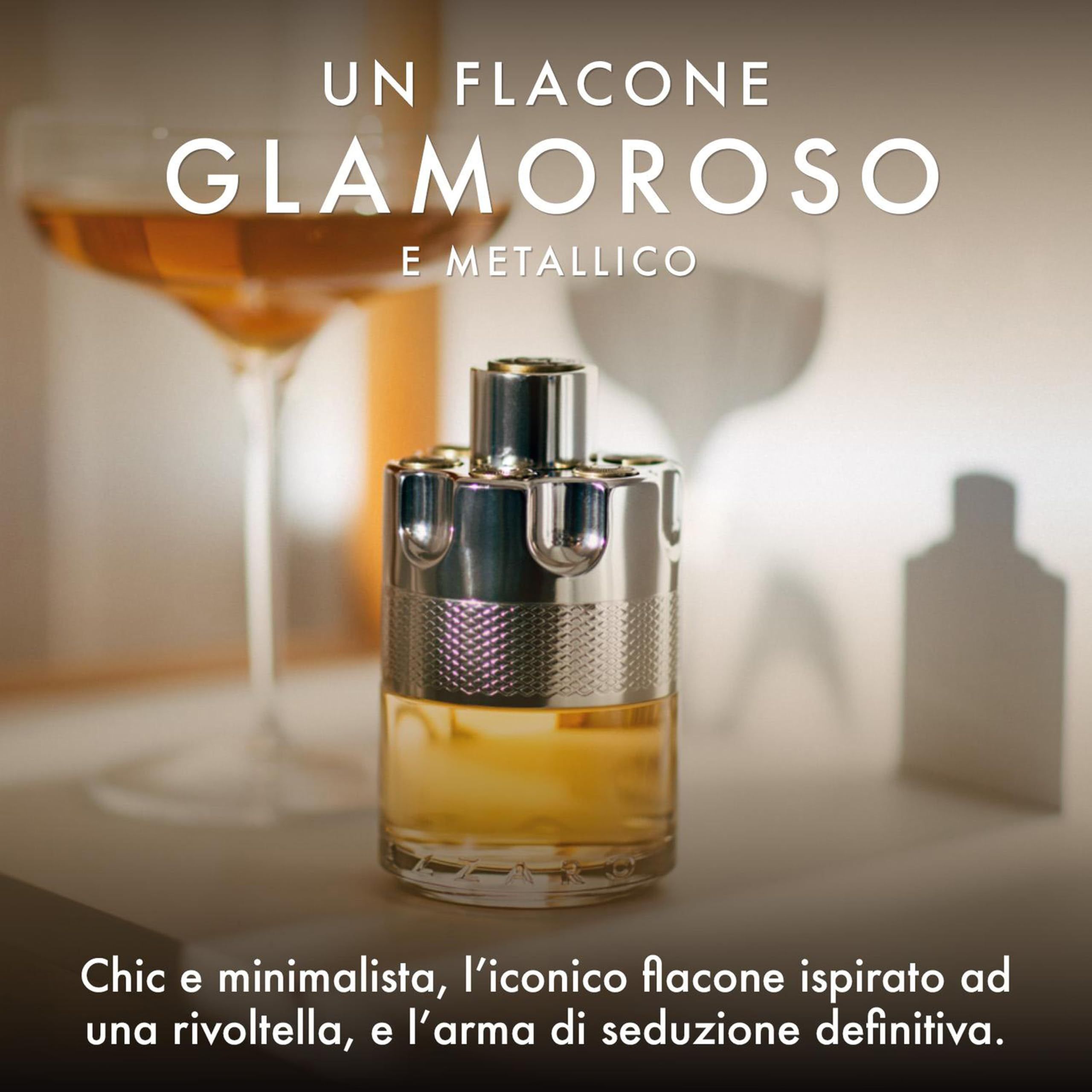Flacone Azzaro Wanted Eau de Toilette glamour e metallico, ispirato a un revolver.