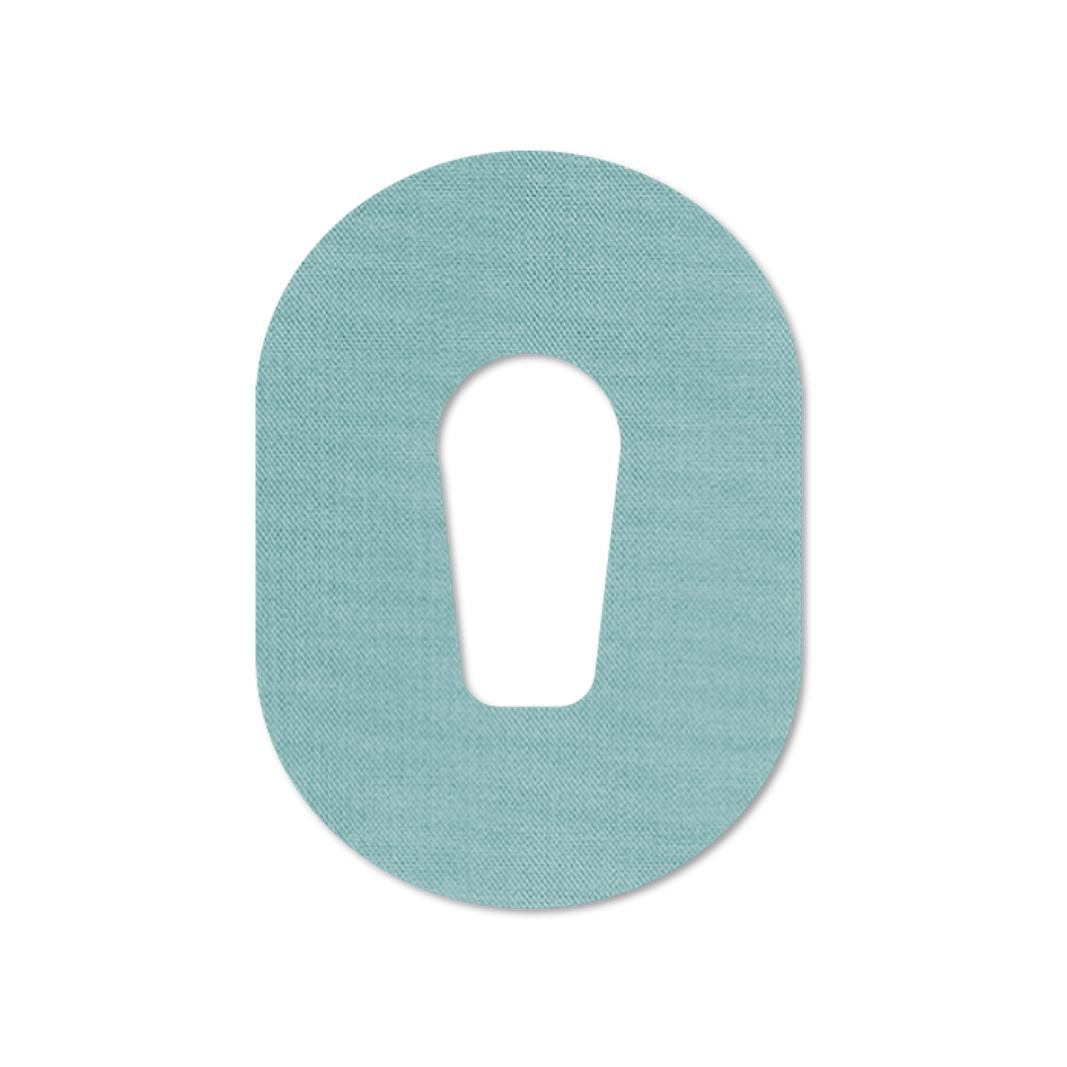 Cerotto di fissaggio ovale con ritaglio centrale. Materiale tessile azzurro chiaro. Per dispositivi medici.