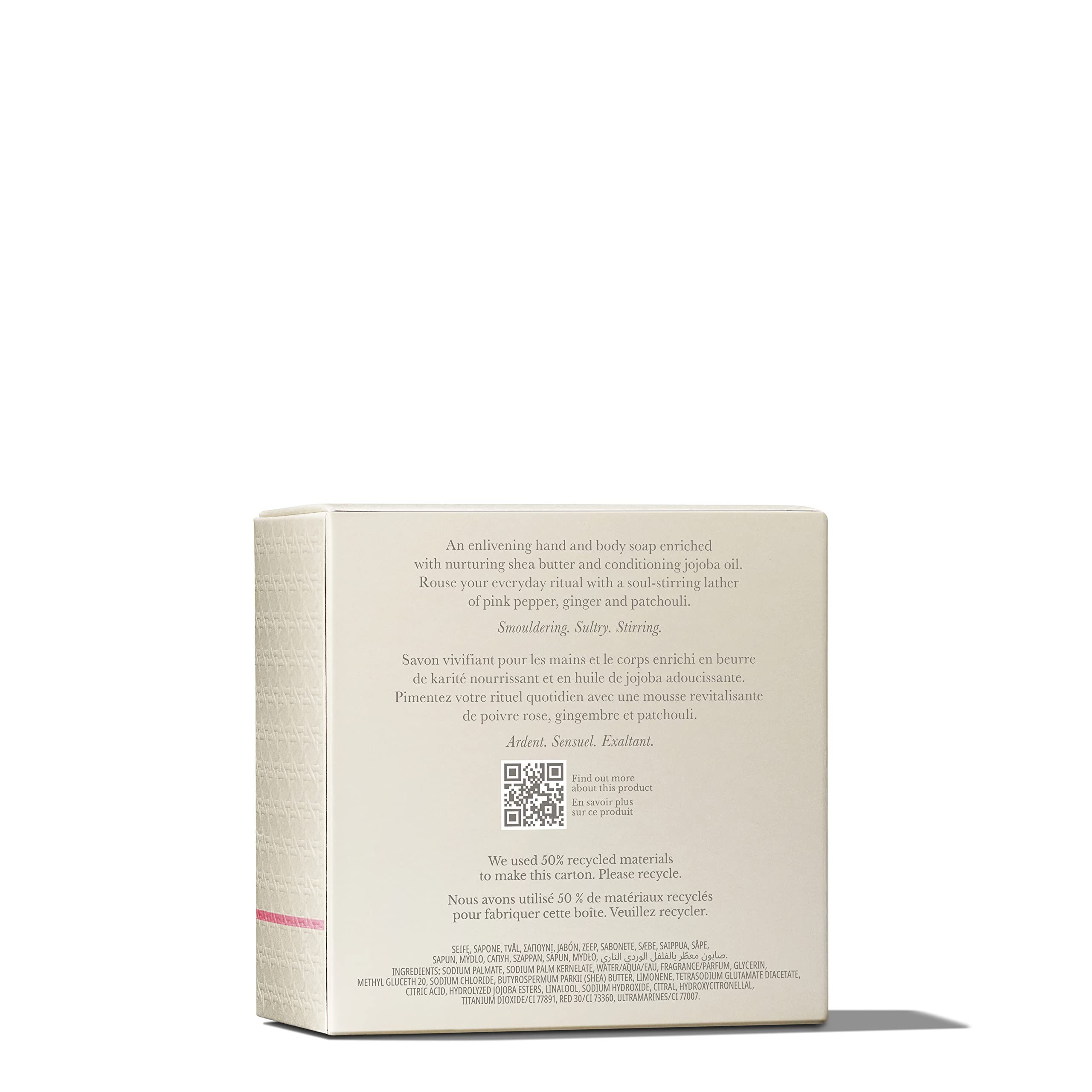 Retro della confezione in cartone con testo. Contiene informazioni sugli ingredienti e il riciclaggio.