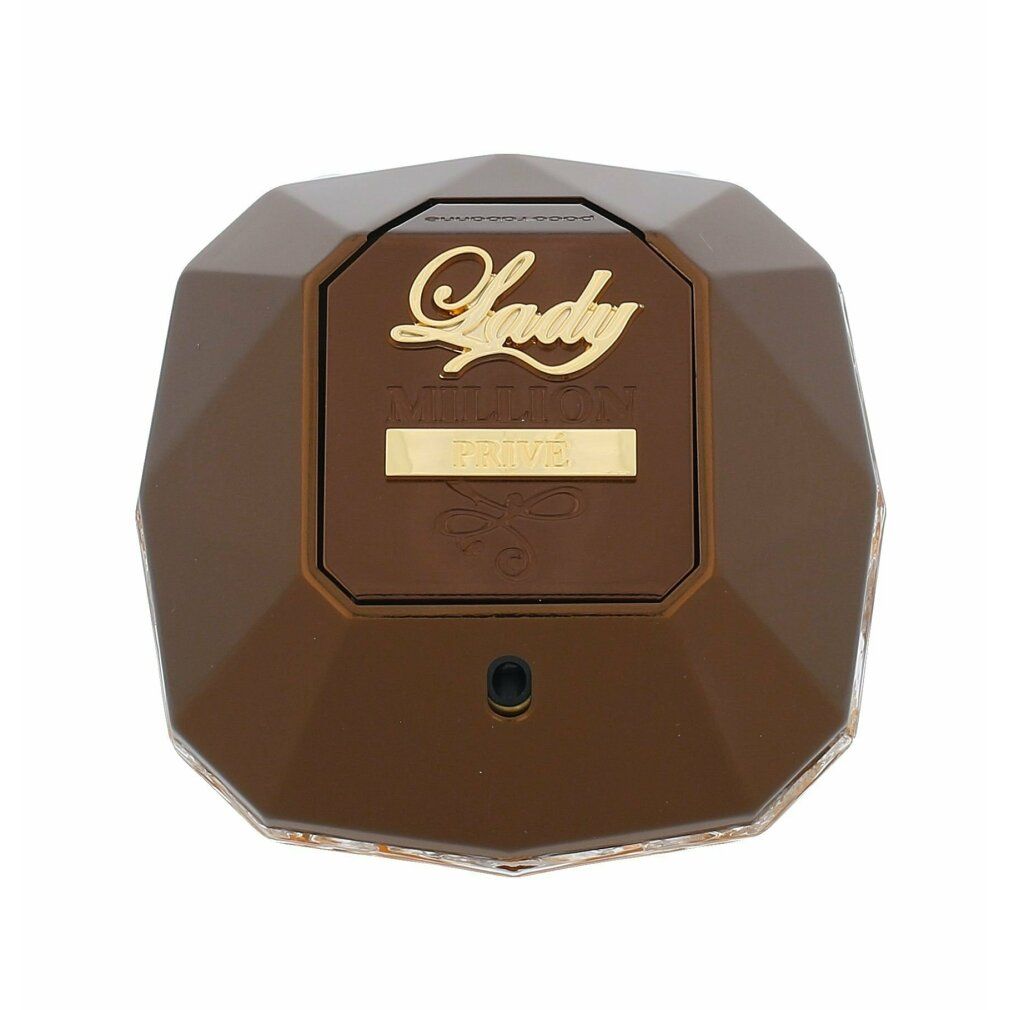 Flacone di profumo marrone. Scritta: Lady Million Privé. Forma angolare, dettagli dorati. Vista dall'alto.
