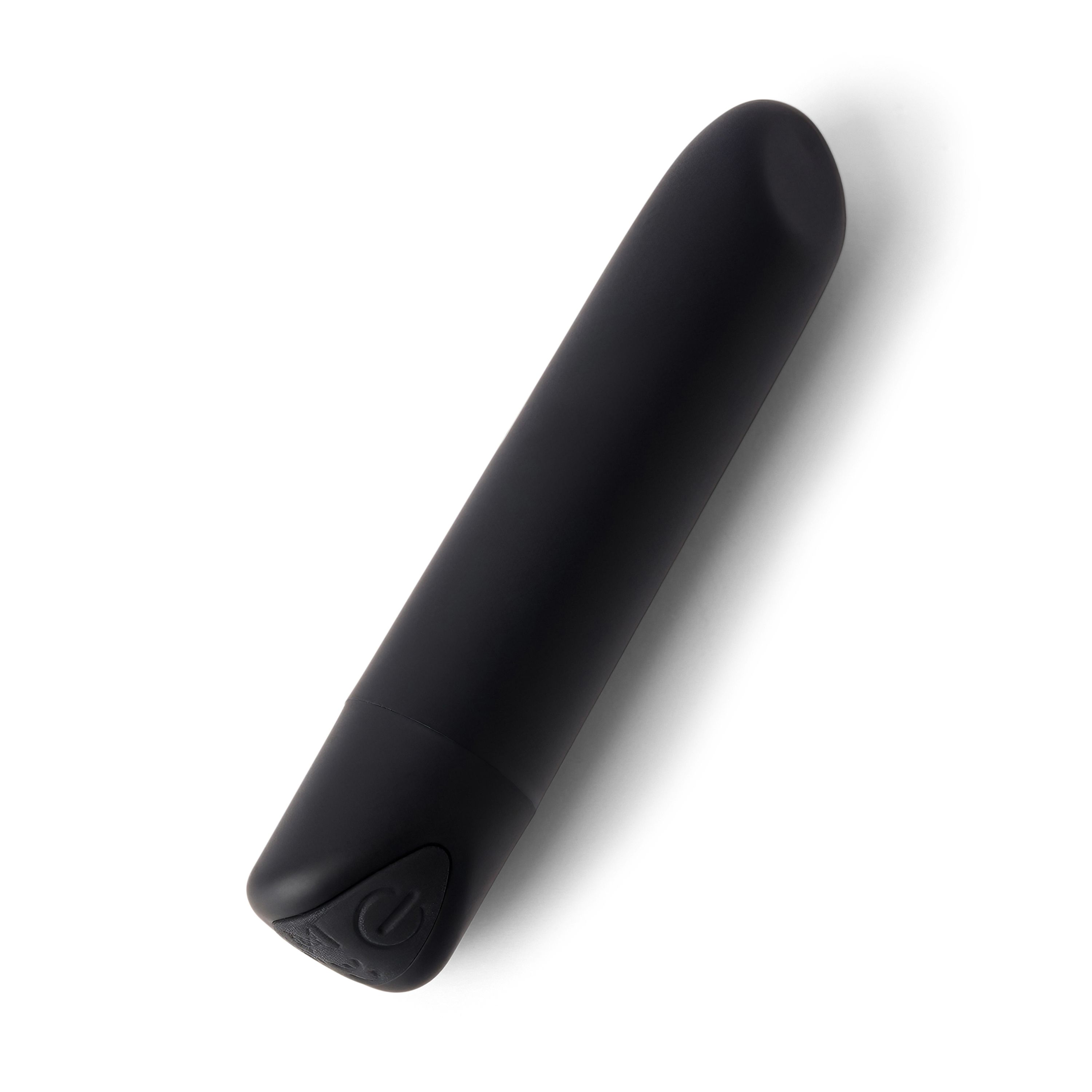 Prodotto benessere nero, cilindrico. Con pulsante di accensione. Su sfondo bianco.