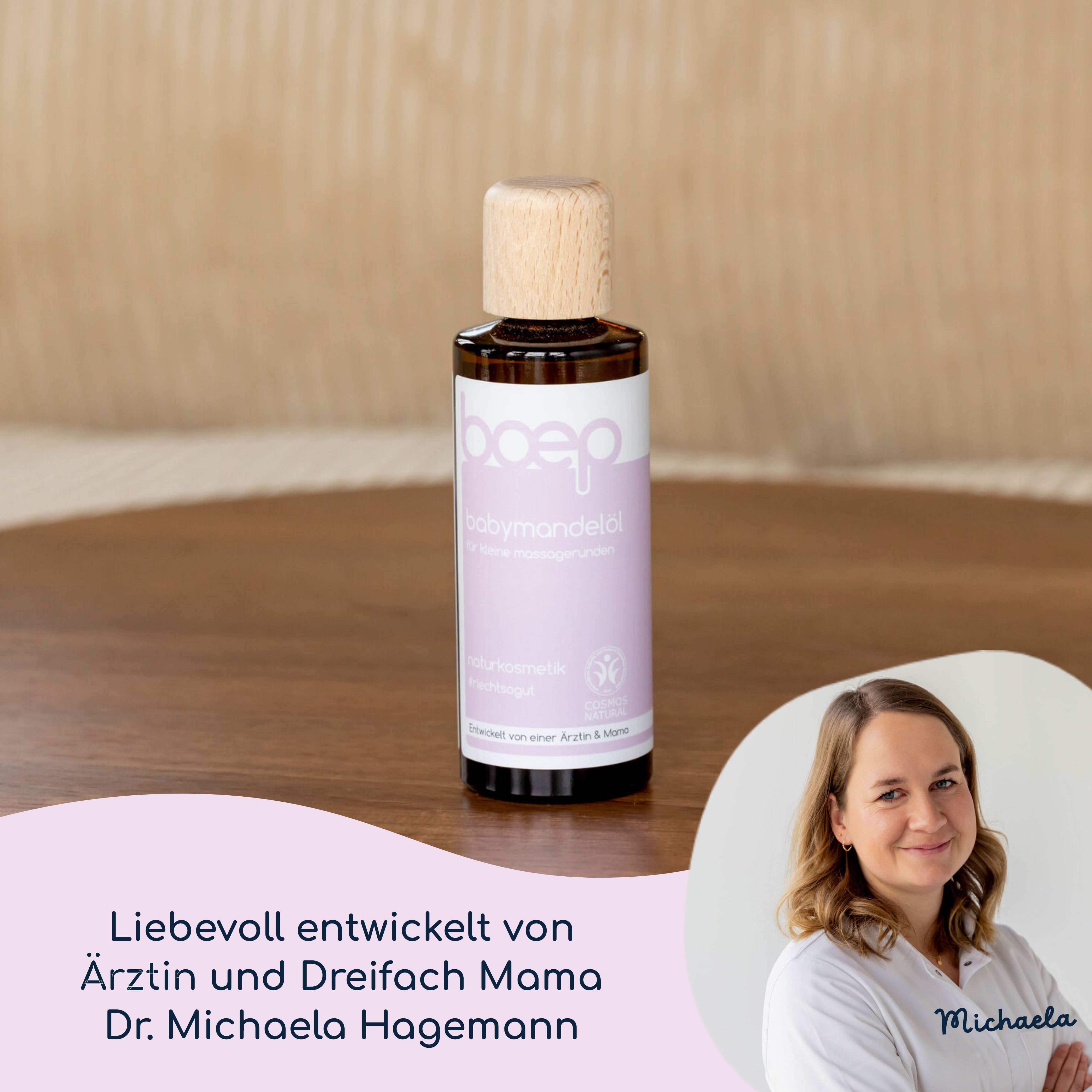 Flacone di vetro marrone con tappo in legno. Scritta: Babymandelöl. Logo: boep. Scritta: Cosmetici naturali. Sviluppato con la Dr. Michaela Hagemann.