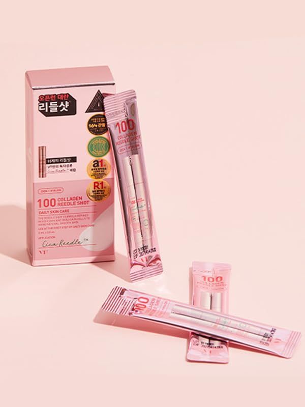 Confezione e bustine rosa con testo. Diverse bustine e una scatola. Scritta: 100 Collagen Reedle Shot.