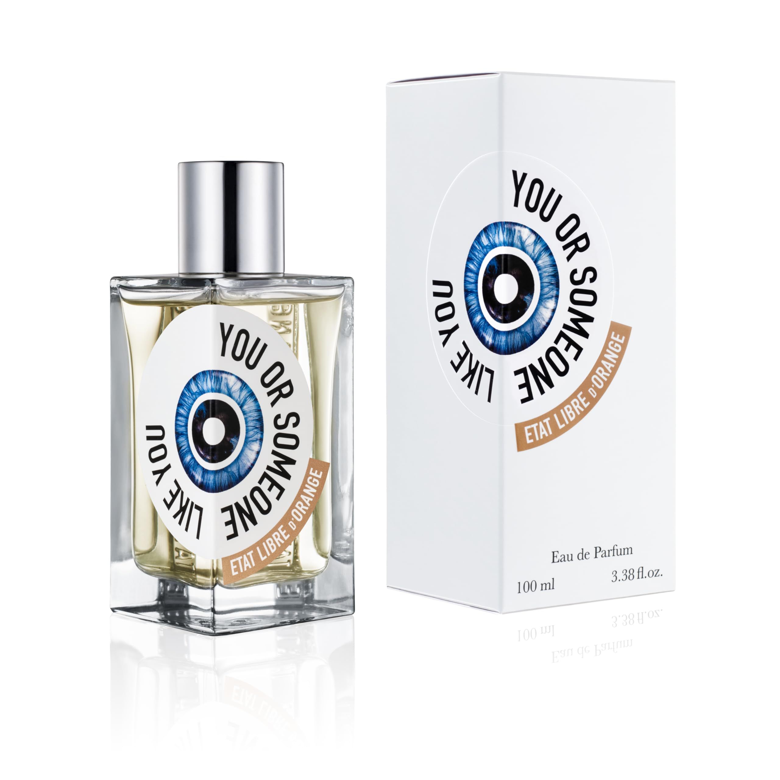 Flacone di profumo e scatola. Etichetta con occhio blu e testo: YOU OR SOMEONE LIKE YOU. Etat Libre d'Orange. 100 ml.