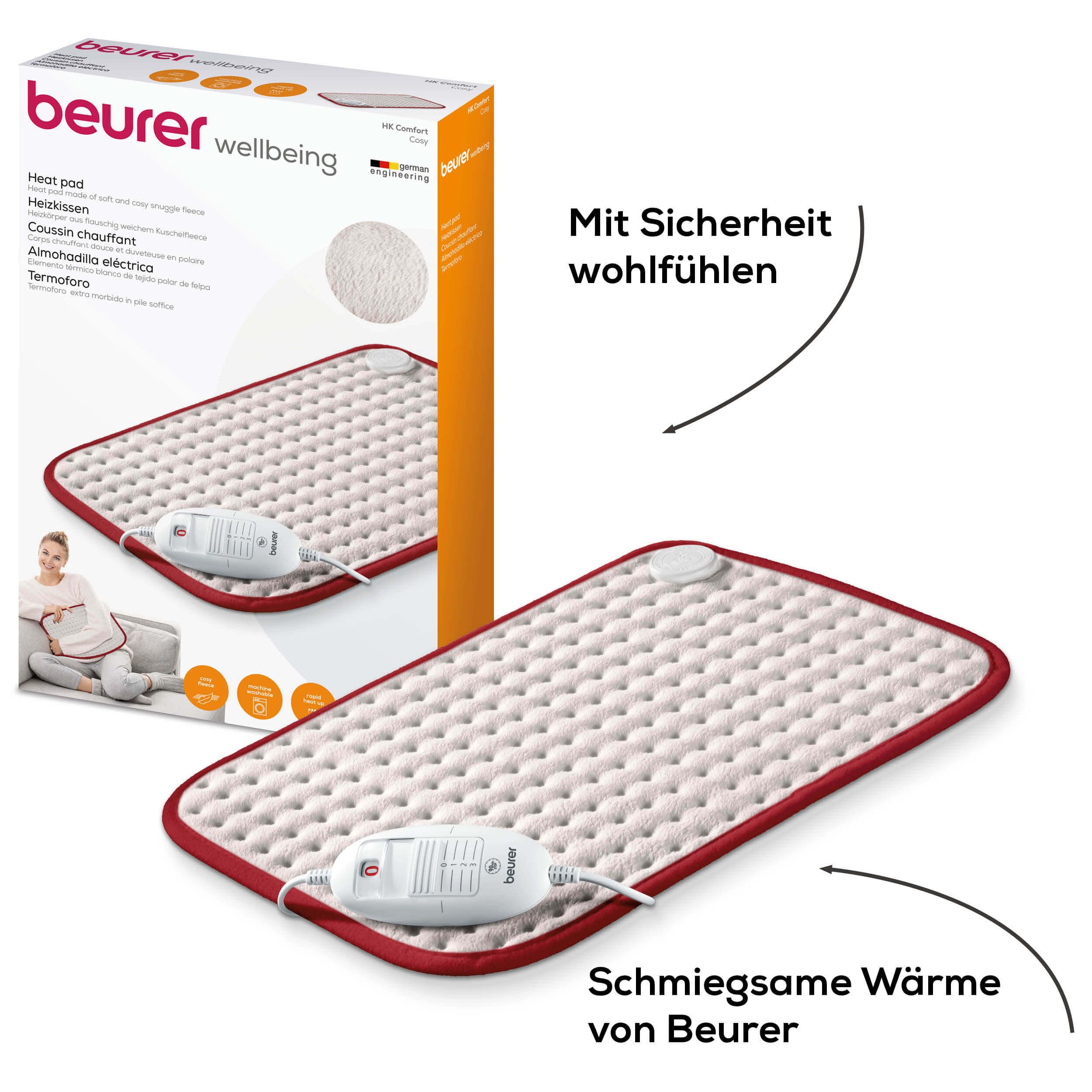 Cuscino riscaldante e confezione. Beurer Wellbeing. Cuscino riscaldante con bordo rosso. Immagine del prodotto e confezione.