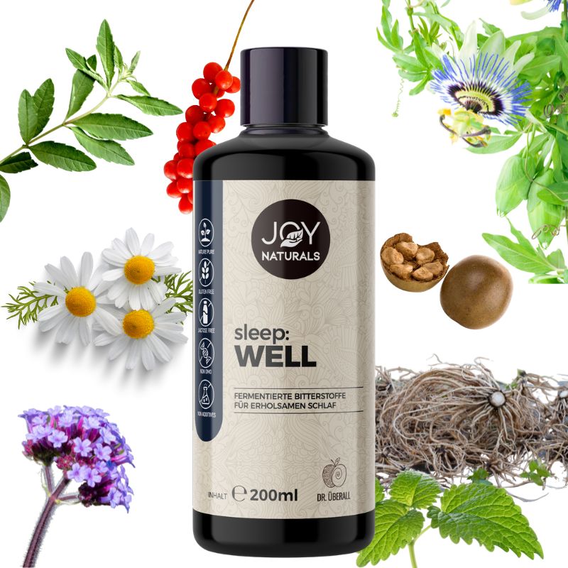 Flacone nero con etichetta. Logo "JOY NATURALS", testo "sleep: well". 200ml. Piante e ingredienti.