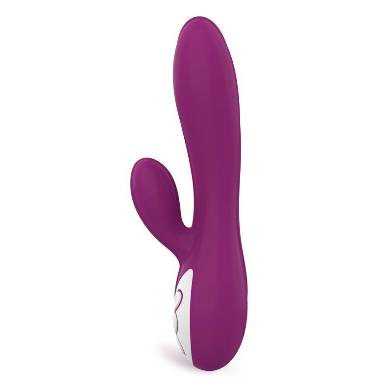 Vibratore viola con due stimolatori e accento bianco. Vista singola.