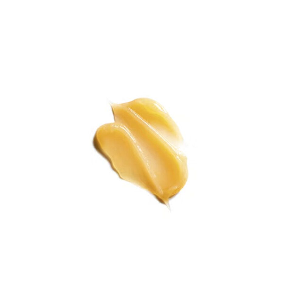 Crema giallastra su sfondo bianco. Due strisce cremose.