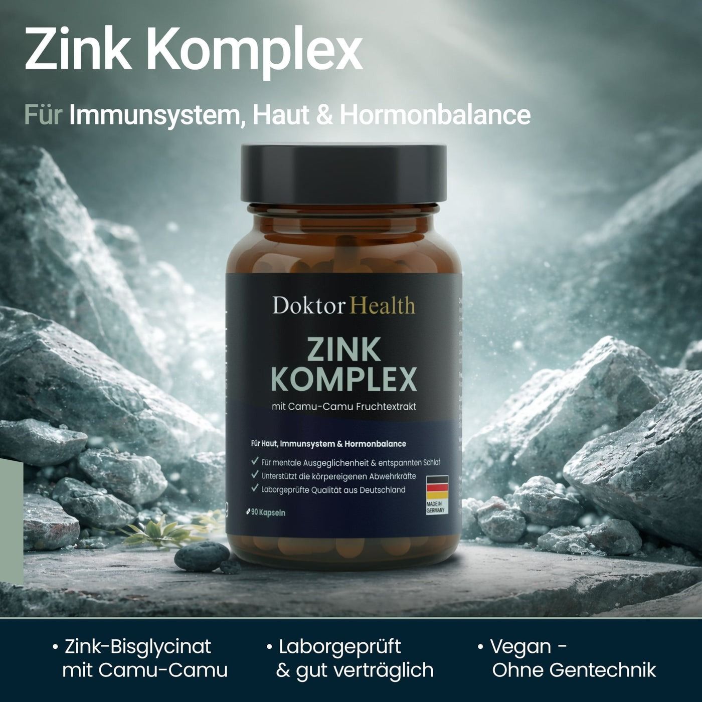 Flacone di vetro marrone con tappo nero. Scritta: Doktor Health Zink Komplex. Capsule. Sfondo: rocce. Testo: Per il sistema immunitario, la pelle e l'equilibrio ormonale.