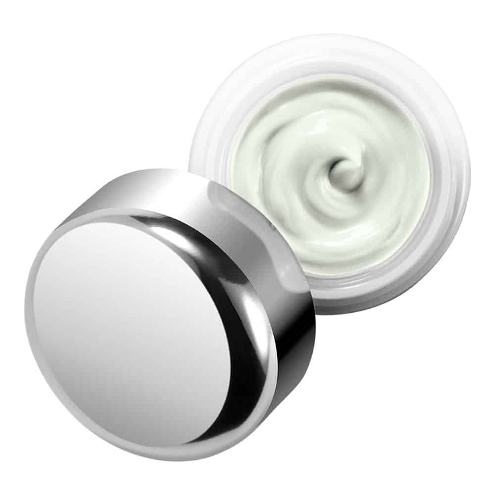 Vasetto bianco con coperchio argentato, aperto. All'interno si vede una crema verde chiaro.