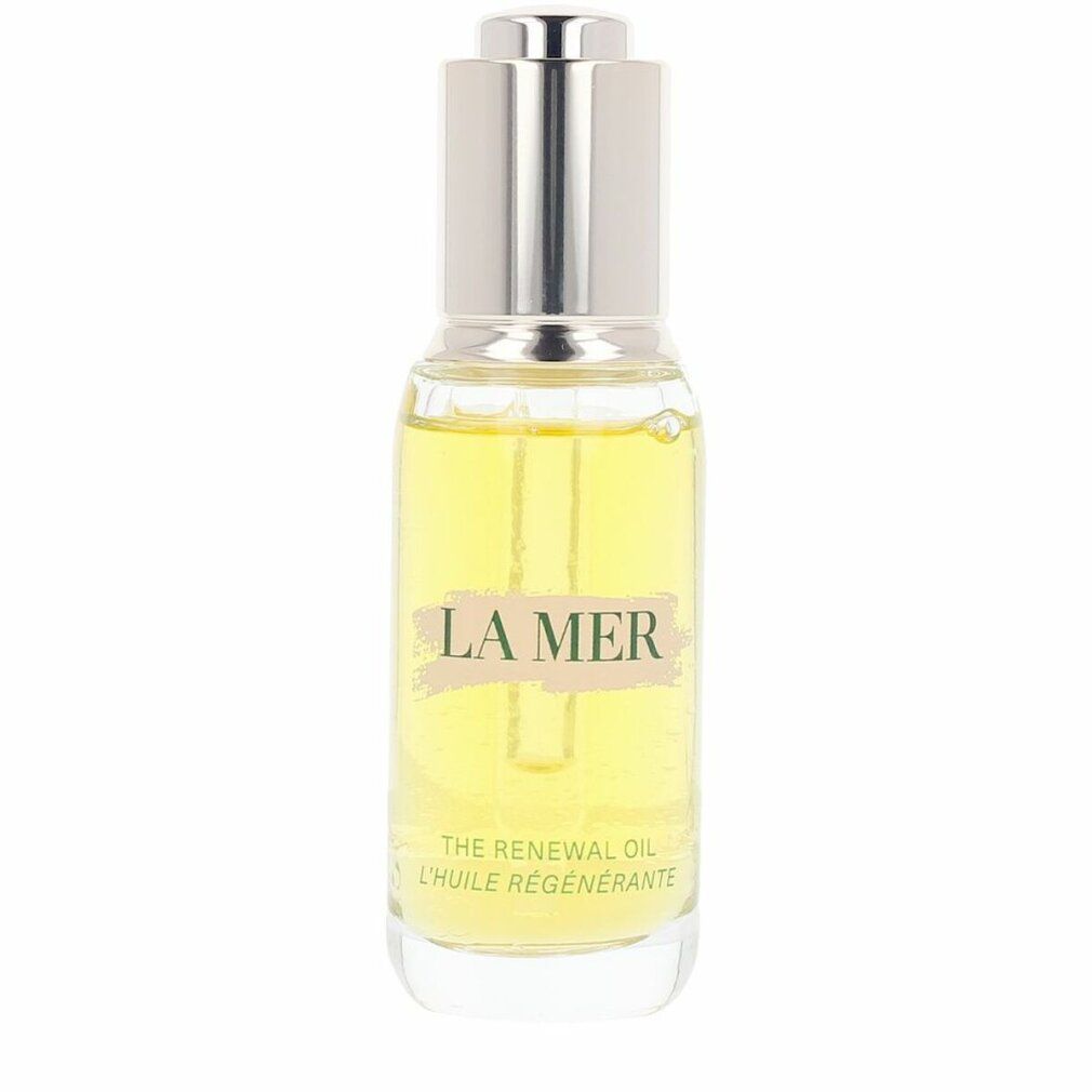 Flacone in vetro con olio giallo e tappo argentato. Scritte: LA MER, THE RENEWAL OIL, L'HUILE RÉGÉNÉRANTE.