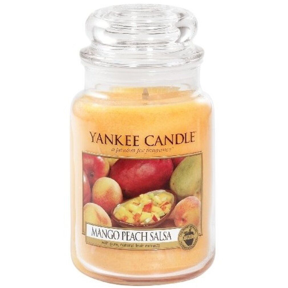 Candela profumata Mango Peach Salsa in vaso con coperchio. Etichetta con frutta. Marchio: Yankee Candle.