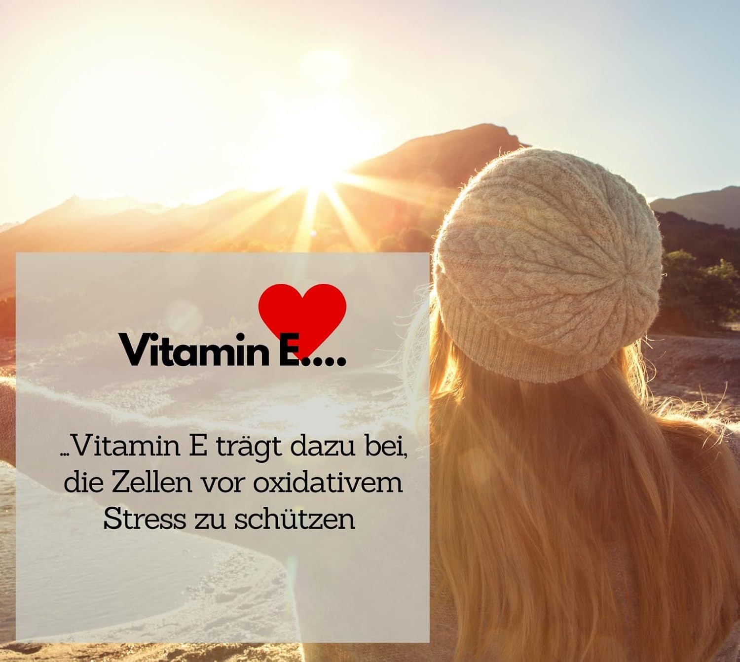 Donna guarda il sole. Testo: La vitamina E aiuta a proteggere le cellule dallo stress ossidativo.