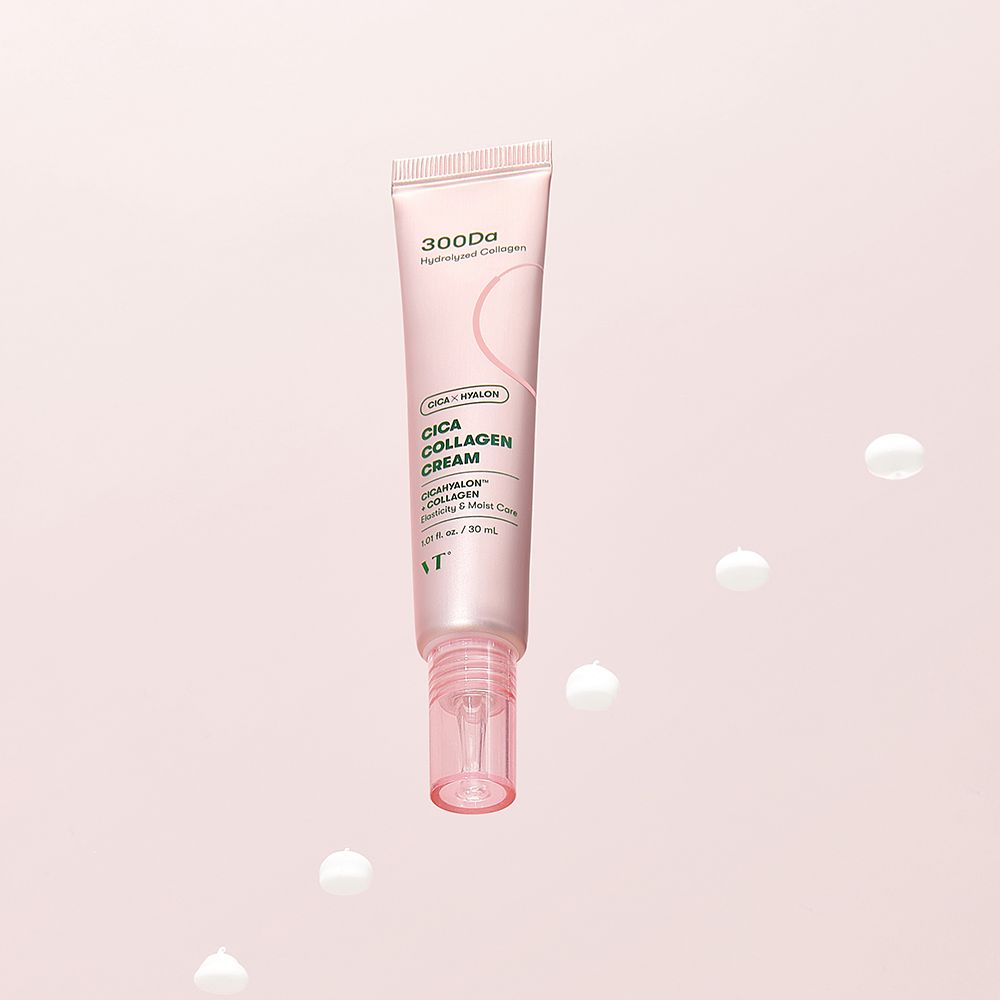 Tubo rosa con crema. 300Da, Cica Kollagen Creme. Cadono gocce bianche.