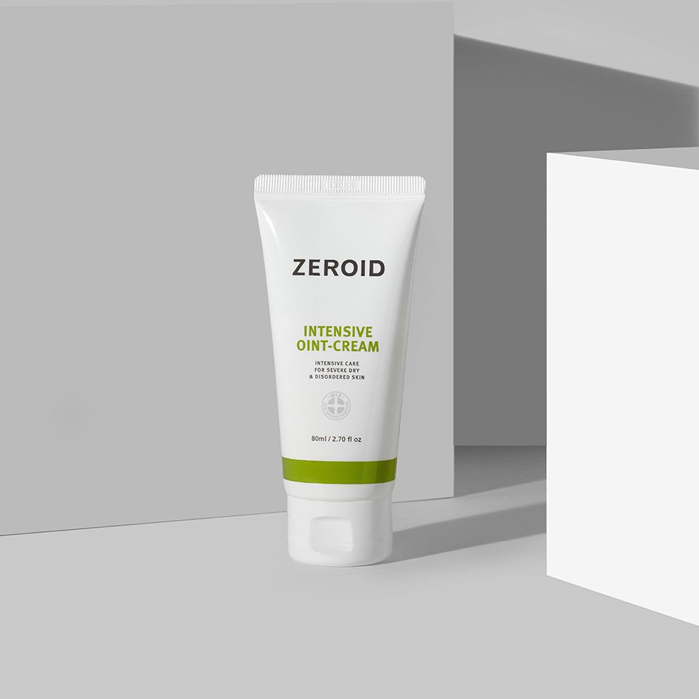 Tubo bianco con fascia verde. Scritta ZEROID, INTENSIVE OINT-CREAM. Prodotto su sfondo grigio.