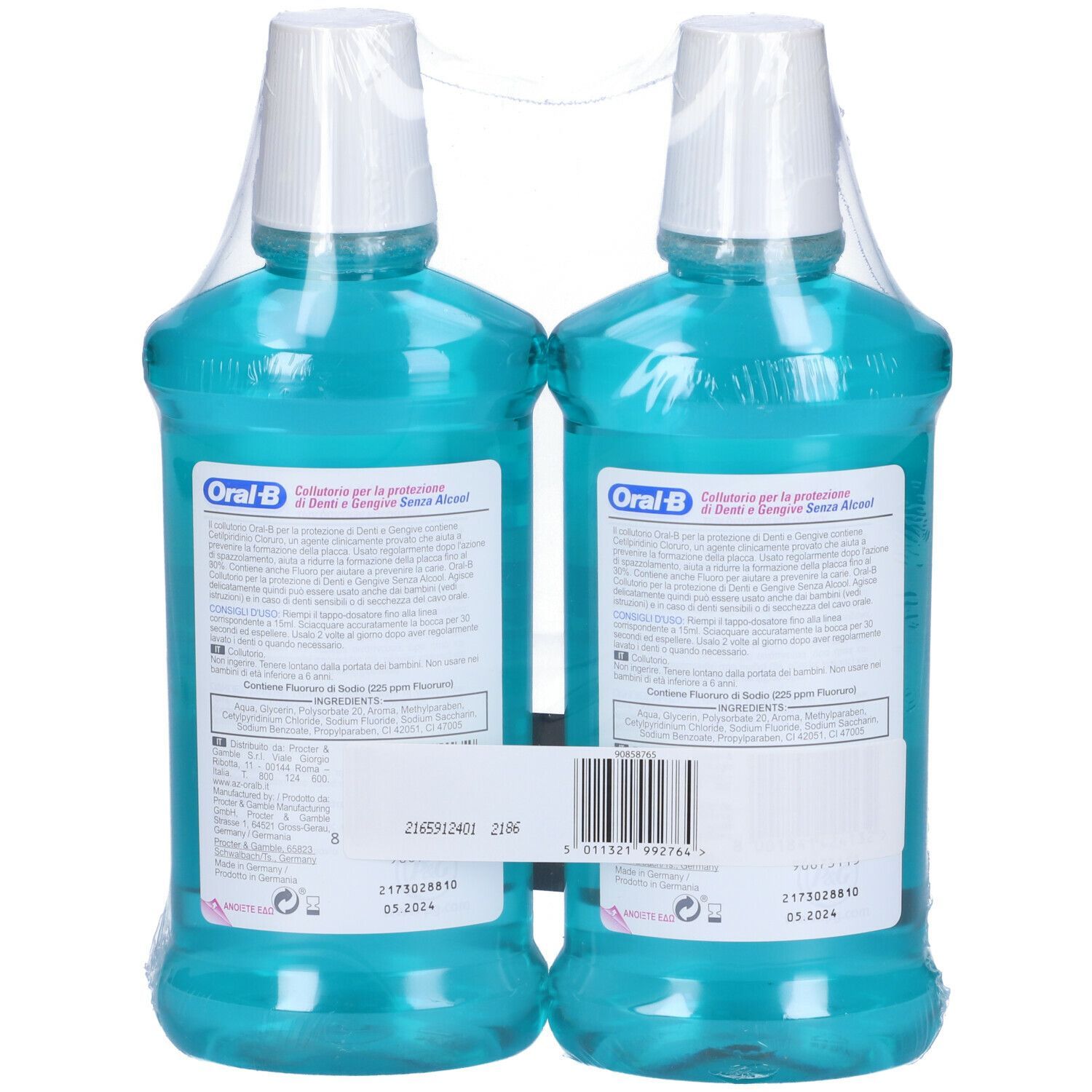 Due bottiglie di collutorio confezionate in pellicola. Vista posteriore. Liquido turchese, tappo bianco, etichetta blu. Scritta in italiano.