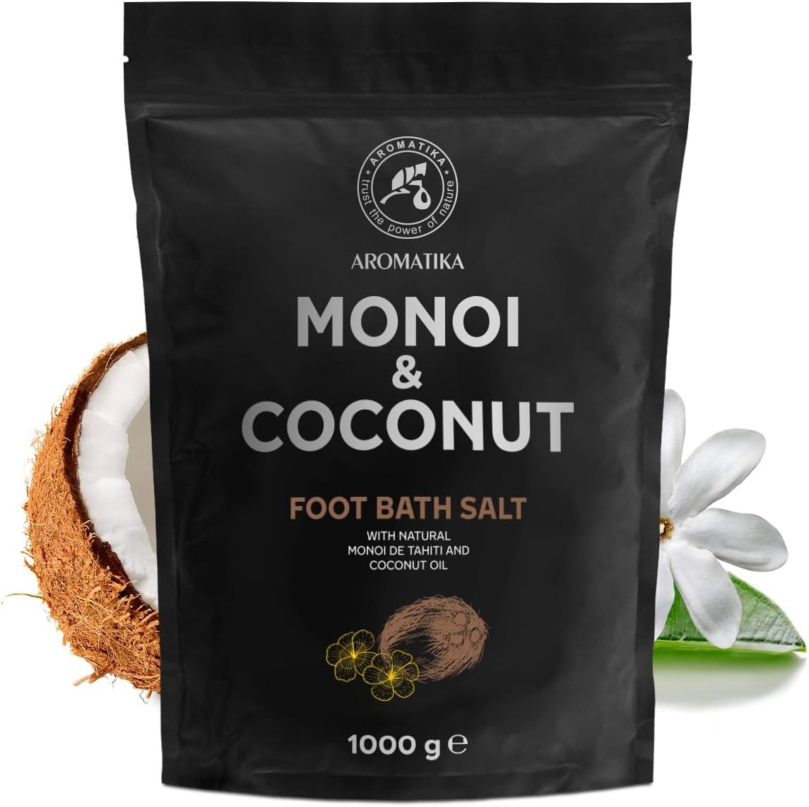 Confezione nera con logo e nome del prodotto. Cocco e fiore come decorazione. Testo: Monoi & Coconut Foot Bath Salt.